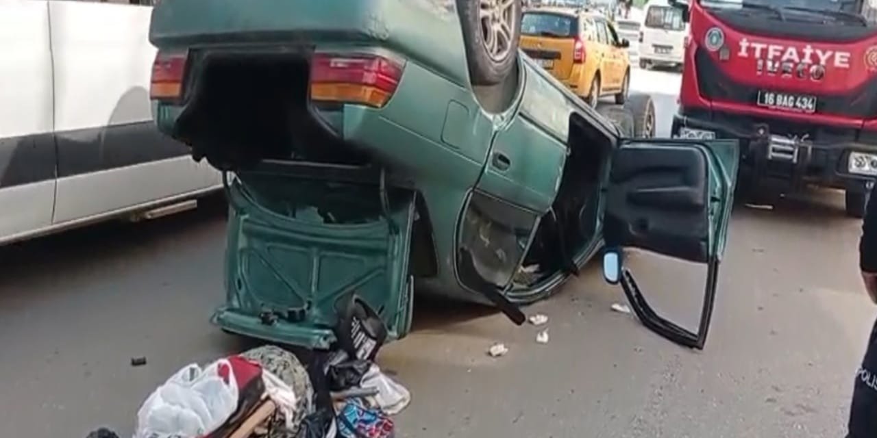 Bursa’da otomobil takla attı: Sürücü araçta sıkıştı!